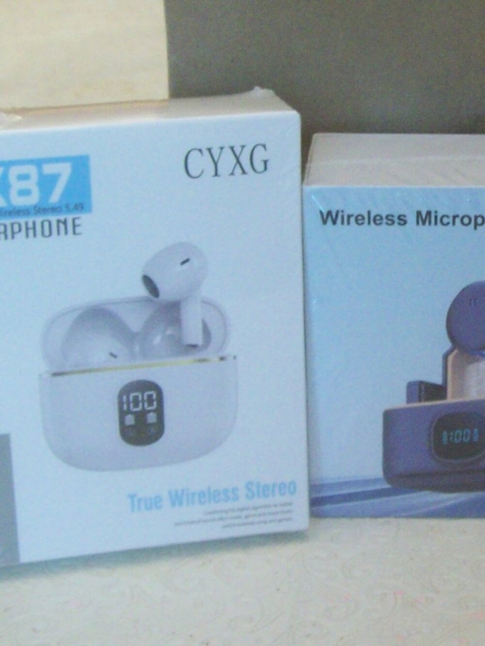 Wireless Electronic Bundle: Two Sets of Earbuds and One Microphone, All NIB!!!